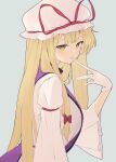  1girl biting blonde_hair commentary dress glove_biting gloves hair_ribbon hat hat_ribbon highres kanpa_(campagne_9) long_hair looking_at_viewer mob_cap red_ribbon ribbon solo touhou white_dress white_gloves wide_sleeves yakumo_yukari yellow_eyes 