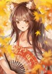  1girl absurdres animal_ears autumn bangs blurry blurry_foreground blush brown_eyes brown_hair fang hand_fan highres holding holding_fan hymgkamui japanese_clothes kimono leaf long_hair looking_at_viewer open_mouth original solo tail wolf_ears wolf_girl wolf_tail 