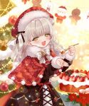  1girl bell cake cape christmas christmas_tree dress food hat highres indie_virtual_youtuber long_hair long_sleeves looking_at_viewer merry_christmas pale_skin purple_hair santa_costume santa_hat tsukimiya_selene virtual_youtuber yellow_eyes yutsuka_(amyucca) 