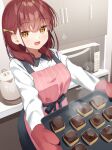  1girl :d apron bangs brown_eyes commentary_request eyebrows_visible_through_hair food hair_behind_ear hair_over_shoulder highres holding indoors long_sleeves looking_at_viewer microwave muninshiki original pink_apron red_hair red_mittens shirt smile solo standing steam white_shirt younger_twin_sister_(muninshiki) 