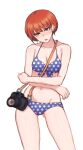  1girl absurdres blush breasts camera crossed_arms danganronpa_(series) danganronpa_2:_goodbye_despair embarrassed freckles green_eyes head_tilt highres koizumi_mahiru looking_at_viewer medium_breasts navel open_mouth polka_dot polka_dot_swimsuit red_hair seongkun_(agn000) short_hair simple_background solo swimsuit white_background 