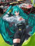  1girl :d absurdres aqua_eyes aqua_hair bangs black_bodysuit black_legwear bodysuit breasts clothes_writing cowboy_shot crop_top eyebrows_visible_through_hair flag goodsmile_racing hair_between_eyes hatsune_miku headphones highres holding holding_flag itasha long_hair long_sleeves looking_at_viewer medium_breasts mercedes-benz official_alternate_costume open_mouth race_queen racecar racing_miku_(2022) sawkm signature single_thighhigh smile solo thighhighs twintails two-tone_gloves very_long_hair vocaloid 