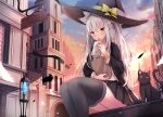  1girl bag bangs black_cat black_legwear blush cat city food grey_hair hat highres holding holding_food long_hair looking_at_viewer original outdoors paper_bag pleated_skirt red_eyes sitting skirt solo sunset taiyaki thighhighs touhourh wagashi witch_hat 
