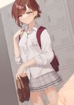  1girl backpack bag bangs blurry blurry_background brown_hair commentary_request dutch_angle hair_ornament hairclip highres higuchi_madoka idolmaster idolmaster_shiny_colors loafers miniskirt mitora_nao mole mole_under_eye plaid plaid_skirt pleated_skirt purple_eyes school_uniform shirt shoe_locker shoes shoes_removed short_hair skirt sleeves_rolled_up solo sweat swept_bangs tied_hair white_shirt 