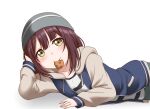  1girl blush brown_hair closed_mouth eating eyebrows_visible_through_hair food_in_mouth highres hood hoodie jan_azure long_sleeves looking_at_viewer lying on_side short_hair smile solo toki_ayano yellow_eyes yurucamp 