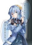  1girl blue_coat blue_eyes blue_hair box coat gift gift_box gotland_(kancolle) holding holding_gift kantai_collection long_hair long_sleeves mole mole_under_eye official_alternate_costume open_clothes open_coat remimiku sidelocks solo thought_bubble translation_request 