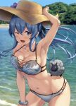  1girl ;d arm_up armpits bangle bikini blue_bikini blue_eyes blue_hair blush bracelet breasts cleavage collarbone day eyebrows_visible_through_hair gotland_(kancolle) groin hair_between_eyes hat highres ichikawa_feesu jewelry kantai_collection leaning_forward long_hair looking_at_viewer medium_breasts mole mole_under_eye navel one_eye_closed open_mouth outdoors revision sheep smile solo stomach straw_hat sun_hat swimsuit thighs 