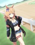  1girl absurdres animal_ears bandeau bangs black_choker black_jacket blonde_hair blue_bow blue_eyes blue_sky bow breasts choker cleavage commentary_request denim denim_shorts ear_bow eyebrows_visible_through_hair feet_out_of_frame gloves gold_city_(umamusume) hand_on_hip highres horse_ears jacket long_hair long_sleeves looking_at_viewer midori_mushi midriff navel outdoors parted_lips short_sleeves shorts single_glove sky smile solo standing stomach strapless striped_bandeau tail thigh_strap thighs tube_top umamusume v-shaped_eyebrows white_gloves 