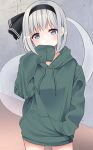  1girl absurdres alternate_costume bangs black_hairband black_ribbon blue_eyes blush breasts closed_mouth commentary_request eyebrows_visible_through_hair floor ghost green_hoodie grey_hair hairband hand_in_pocket hand_up highres hitodama hood hoodie konpaku_youmu konpaku_youmu_(ghost) long_sleeves looking_at_viewer medium_breasts naked_hoodie no_pants puffy_long_sleeves puffy_sleeves ribbon short_hair solo standing stigma1101 touhou wall 