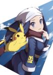  1girl akari_(pokemon) black_hair black_legwear black_sash blue_jacket blue_skirt commentary_request eyelashes floating_scarf grey_eyes hand_up head_scarf highres jacket logo long_hair looking_at_viewer looking_to_the_side pantyhose pikachu pokemon pokemon_(creature) pokemon_(game) pokemon_legends:_arceus red_scarf roka_(o-yasumi) sash scarf sidelocks skirt smile white_headwear 