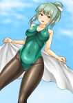  1girl black_legwear blue_sky breasts brown_eyes cloud commentary_request competition_swimsuit covered_navel feet_out_of_frame from_below green_hair green_swimsuit hair_ribbon kantai_collection kudou_(ooabareteng) looking_at_viewer medium_breasts one-piece_swimsuit pantyhose pantyhose_under_swimsuit ponytail ribbon sky solo standing swimsuit towel yuubari_(kancolle) yuubari_kai_ni_(kancolle) 
