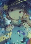  1boy bandaid bedroom commentary_request crown dinosaur from_above looking_at_viewer looking_up male_focus messy noeyebrow_(mauve) original pencil short_hair star_(symbol) toy 