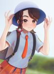  1girl absurdres backpack bag bangs blurry blurry_background blush braid brown_bag brown_eyes brown_hair closed_mouth collared_shirt commentary_request day eyelashes female_protagonist_(pokemon_sv) grey_headwear grey_shirt hair_ornament hands_on_headwear hat highres long_hair necktie orange_necktie orange_shorts outdoors pokemon pokemon_(game) pokemon_sv shirt short_sleeves shorts single_braid smile solo zero_artbox 