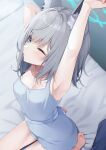  1girl alternate_costume animal_ear_fluff animal_ears armpits arms_up blue_archive blue_camisole blue_halo blue_shorts camisole grey_hair halo highres on_bed one_eye_closed sasakichi_(ssk_chi) seiza shiroko_(blue_archive) shorts sitting stretching wolf_ears 