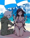  1boy 1girl :d :o bangs beach bikini black_hair blanket blue_sky blush breasts brown_hair cleavage cloud collarbone danganronpa_(series) danganronpa_2:_goodbye_despair day dosugon green_jacket grey_hair hair_over_one_eye hood hood_down jacket komaeda_nagito large_breasts long_hair lotion medium_hair messy_hair mole mole_under_eye multicolored_hair navel ocean outdoors shiny shiny_skin sky smile sunscreen swimsuit teeth tsumiki_mikan two-tone_hair upper_teeth 