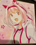  1girl :d animal_ears bow commentary_request ear_bow flower-shaped_pupils gym_shirt hair_intakes hairband haru_urara_(umamusume) highres horse_ears jacket long_hair looking_at_viewer moko39_takasora open_clothes open_jacket photo_(medium) pink_hair ponytail red_eyes red_hairband shirt smile solo symbol-shaped_pupils traditional_media umamusume upper_body white_bow white_jacket white_shirt 