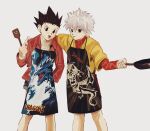  2boys :p apron black_eyes black_hair child dragon_print frying_pan gon_freecss highres holding holding_frying_pan hunter_x_hunter killua_zoldyck male_focus miko_hxh multiple_boys simple_background smile spiked_hair tongue tongue_out white_hair 