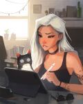  1girl bare_shoulders biting black_choker black_eyes cat choker drawing earrings eyewear_removed highres holding holding_pen indoors jewelry lip_biting lips long_hair parted_lips pen sam_yang sleeveless tattoo white_hair 