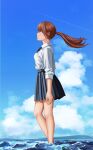 1girl absurdres black_bow black_bowtie black_skirt blue_sky bow bowtie brown_eyes brown_hair cloud commentary contrail day feet_out_of_frame from_side highres long_hair nemo_ringo ocean original outdoors pleated_skirt ponytail profile school_uniform shirt skirt sky sleeves_rolled_up solo symbol-only_commentary wading white_shirt 