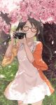  1girl :d ^_^ ^o^ black_hair blurry blurry_foreground camera cherry_blossoms closed_eyes depth_of_field falling_petals glasses grass grin hanetsuka holding holding_camera idolmaster idolmaster_shiny_colors mitsumine_yuika outdoors petals single-lens_reflex_camera smile solo twintails wide_sleeves 
