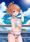  1girl bangs bikini blue_sky blurry blurry_background breasts brown_hair cloud cloudy_sky commentary cowboy_shot cup day depth_of_field drinking_glass drinking_straw eyebrows_visible_through_hair floral_print food from_side fruit halterneck hand_in_hair highres hojo_karen holding holding_cup horizon ice idolmaster idolmaster_cinderella_girls jewelry lime_(fruit) lime_slice looking_at_viewer medium_breasts medium_hair mismatched_bikini multi-strapped_bikini navel necklace ocean open_mouth outdoors ponytail print_bikini railing sky smile solo standing swimsuit water_drop yuuichi_(reductionblack) 