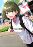  1girl absurdres backpack bag blurry blurry_background blush depth_of_field dutch_angle green_eyes green_hair highres idolmaster idolmaster_shiny_colors looking_at_viewer nanakusa_nichika print_shirt shirt short_hair solo sweatdrop tera2001 v-shaped_eyebrows 