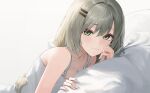  1girl :3 absurdres bare_shoulders breasts check_copyright cleavage collarbone copyright_request green_eyes grey_hair hair_ornament hairclip highres junkt729 long_hair looking_at_viewer original pillow shirt sleeveless sleeveless_shirt smile solo spaghetti_strap white_shirt 