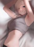  1girl :d absurdres armpits arms_up bed_sheet blonde_hair blush crop_top gadeung_hye grey_tank_top grin highres looking_at_viewer lying midriff on_side original smile solo tank_top 