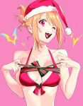  1girl ;d bikini blonde_hair breasts cleavage collarbone fangs green_ribbon hat henken highres looking_at_viewer medium_breasts one_eye_closed original pink_background red_bikini red_eyes red_headwear ribbon santa_hat short_hair short_ponytail sienna_(henken) simple_background smile solo swimsuit teeth upper_body upper_teeth 