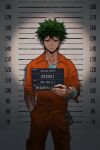  1boy boku_no_hero_academia character_name cuffs english_commentary english_text freckles green_hair hand_in_pocket handcuffs height_chart height_mark highres holding holding_sign lineup looking_at_viewer midoriya_izuku mugshot prison_clothes sign solo teanmoi 