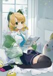  1girl bangs blonde_hair blue_archive bow cat_ear_headphones couch eru_daydream green_eyes hair_bow headphones highres indoors jacket midori_(blue_archive) navel necktie nintendo_switch on_couch peroro_(blue_archive) pillow pout shirt short_hair shorts thighhighs twitter_username white_shirt window 
