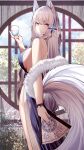  1girl absurdres animal_ear_fluff animal_ears azur_lane bangs bare_shoulders black_dress black_ribbon blue_flower blush breasts brown_eyes closed_mouth cup dress drinking_glass eyebrows_visible_through_hair feet_out_of_frame flower folding_fan fox_ears fox_girl fox_tail from_behind fur_shawl hair_flower hair_ornament hand_fan highres holding holding_cup holding_fan indoors large_breasts large_tail long_hair looking_at_viewer looking_back pelvic_curtain ribbon round_window samip shinano_(azur_lane) sideboob silver_hair solo standing tail very_long_hair window wrist_ribbon 