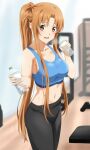  1girl :d alternate_costume asuna_(sao) black_legwear blue_sports_bra braid breasts brown_eyes brown_hair cleavage collarbone commentary_request drink giving gym highres holding holding_drink indoors large_breasts lieass long_hair looking_at_viewer navel pants ponytail smile solo sports_bra sportswear sweat sweatpants sword_art_online 