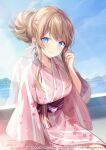  1girl bangs blonde_hair blue_eyes blue_sky blush character_request copyright_request floral_print hair_bun hand_up indoors japanese_clothes kagachi_saku kimono long_hair long_sleeves looking_at_viewer mountain obi ocean parted_lips pink_kimono reflection sash sitting sky smile solo water window 