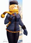  1girl black_headwear black_pants blonde_hair blue_coat blue_eyes blue_mittens breasts coat fur_hat hat highres kolin kosumi long_sleeves medium_breasts pants scarf solo standing street_fighter street_fighter_v ushanka yellow_scarf 