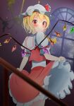  1girl absurdres ascot blonde_hair blurry blurry_foreground blush chandelier crystal depth_of_field flandre_scarlet from_behind from_below hat hat_ribbon highres indoors looking_at_viewer looking_back mob_cap night puffy_short_sleeves puffy_sleeves red_eyes red_ribbon red_skirt ribbon shirt shiso_gohan short_sleeves skirt skirt_set sky smile solo star_(sky) starry_sky touhou vest window wings 