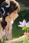  1girl absurdres bad_id bad_twitter_id blue_bow blurry blurry_background bow brown_hair closed_eyes cozyu depth_of_field dress flower from_side hair_bow hair_over_shoulder highres holding holding_flower lying on_stomach original purple_flower solo 