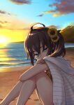  1girl ahoge beach blue_eyes brown_hair cloud eyebrows_behind_hair flower footprints from_side hair_between_eyes hair_flower hair_ornament highres hololive jacket jacket_on_shoulders looking_at_viewer natsuiro_matsuri ocean sabaku_chitai side_ponytail sitting sky solo sunflower sunset virtual_youtuber 