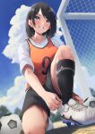  1girl absurdres anemone_noa ball bangs black_hair black_legwear black_shorts blue_eyes blush breasts cloud day full_body goal grin highres kneehighs large_breasts looking_away medium_hair number_print one_knee orange_vest original outdoors shirt shoes short_sleeves shorts smile soccer_ball solo vest white_footwear white_shirt 