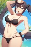  1girl bangs bare_shoulders beach bikini black_bikini black_hair blue_sky blurry blurry_background blush breasts cleavage collarbone genshin_impact green_eyes highres large_breasts long_hair looking_at_viewer mona_(genshin_impact) navel ocean open_mouth samegami scrunchie sky solo swimsuit thighs tree twintails wrist_scrunchie 
