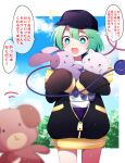  1girl :d absurdres alternate_costume bangs baseball_cap black_headwear black_jacket bright_pupils contemporary cowboy_shot green_eyes green_hair hat highres holding holding_stuffed_toy jacket komeiji_koishi long_sleeves open_mouth outdoors short_hair smile solo speech_bubble standing stuffed_animal stuffed_bunny stuffed_cat stuffed_dog stuffed_toy touhou translation_request white_pupils you_(noanoamoemoe) zipper 