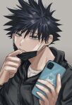  1boy bangs black_hair black_hoodie cellphone commentary_request drawstring fushiguro_megumi fushirun_rung green_eyes hair_between_eyes highres holding holding_phone hood hood_down hoodie jujutsu_kaisen long_sleeves looking_at_viewer male_focus mask mask_pull mouth_mask parted_lips phone shirt short_hair smartphone smile solo spiked_hair 