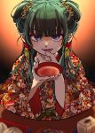  1girl baozi beads blue_eyes blunt_bangs box brown_background chinese_clothes cup double_bun earrings flower food gradient_background green_hair hair_beads hair_bun hair_flower hair_ornament highres holding holding_cup jewelry kusuriya_no_hitorigoto licking_lips lipstick makeup maomao_(kusuriya_no_hitorigoto) peanuts_omr plate smile solo tongue tongue_out 