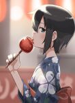  1girl akts625 black_eyes black_hair blue_kimono blurry blurry_background blush breasts candy_apple commentary depth_of_field festival floral_print food food_stand from_side hair_between_eyes hand_up highres holding holding_food japanese_clothes kimono kino_(kino_no_tabi) kino_no_tabi licking long_bangs looking_at_viewer looking_to_the_side loose_hair_strand non-web_source obi portrait red_sash romaji_commentary sash short_hair sidelocks small_breasts solo tongue tongue_out upper_body very_short_hair 