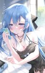  1girl absurdres bangs black_dress blue_hair blush breasts cellphone cleavage closed_mouth crossed_bangs dress emori_miku emori_miku_project hair_between_eyes highres holding holding_phone jewelry long_hair lying necklace on_bed on_side phone purple_eyes smartphone solo yoruhoshi_owl 