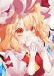  1girl :t ascot baozi blonde_hair blurry blush calpis118 colored_eyelashes commentary_request crystal depth_of_field eating eyes_visible_through_hair flandre_scarlet food frilled_shirt_collar frilled_sleeves frills hair_between_eyes hands_up hashtag-only_commentary hat highres looking_at_viewer medium_hair mob_cap one_side_up puffy_short_sleeves puffy_sleeves red_eyes shirt short_sleeves simple_background solo tareme touhou upper_body white_background white_hat white_shirt wings yellow_ascot 